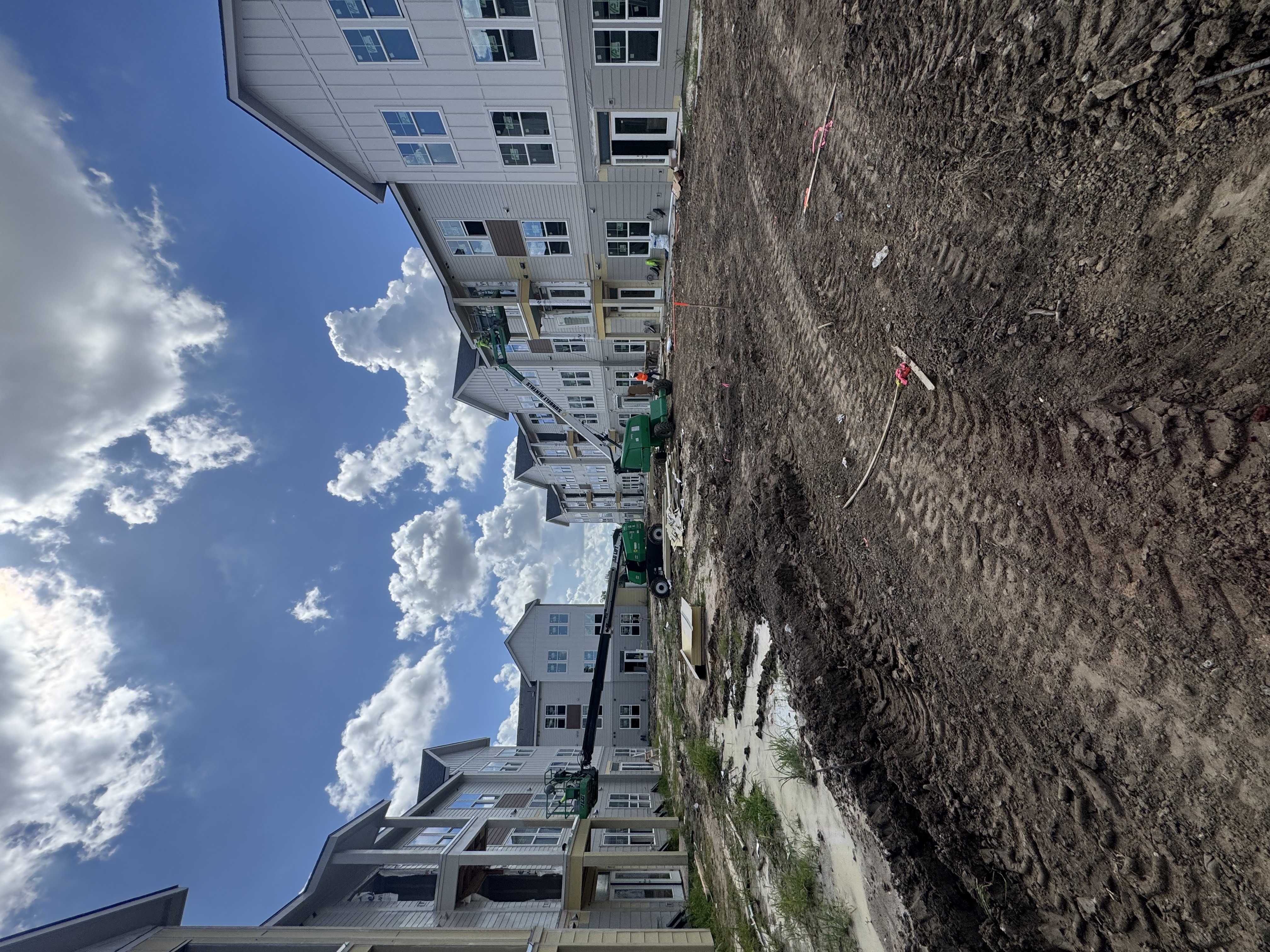 Multi-story apartment complex exterior for HOA community Houston TX