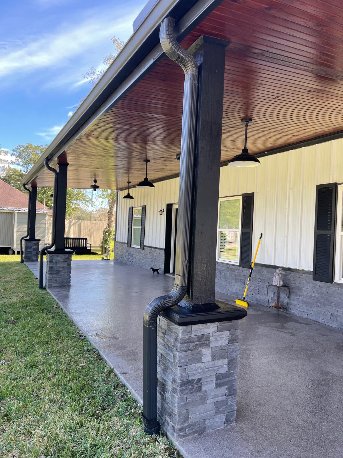 Wide-angle view of finished stained porch ceiling